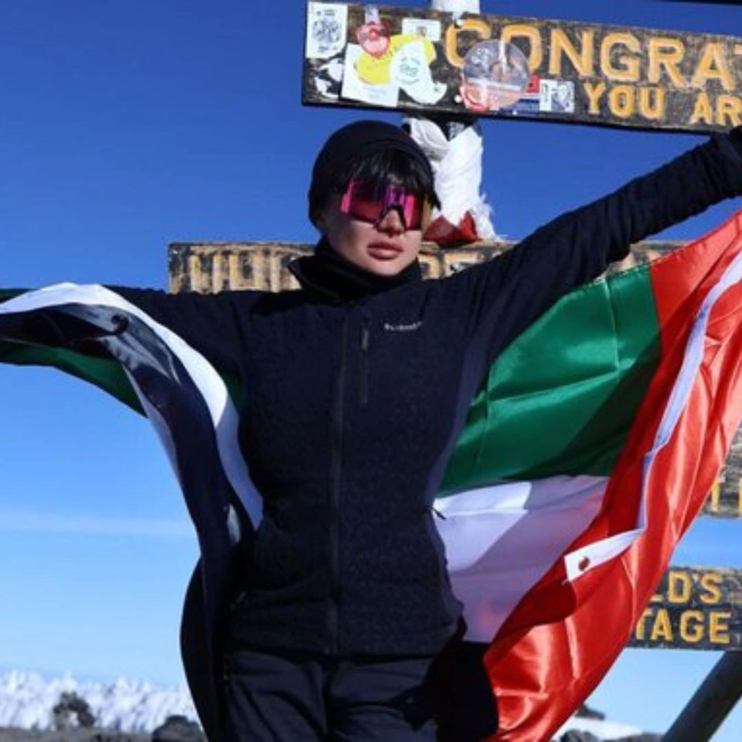 A mother of four celebrated her 45th birthday by raising the UAE flag on Mount Kilimanjaro, marking achievement.